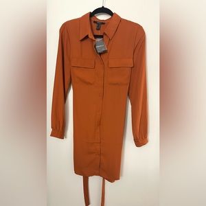 Button down long sleeve dress. Brand new never been worn size medium